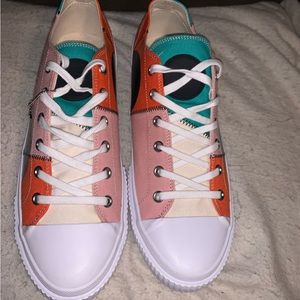 Size 12us men’s designer shoe. Multi color never worn